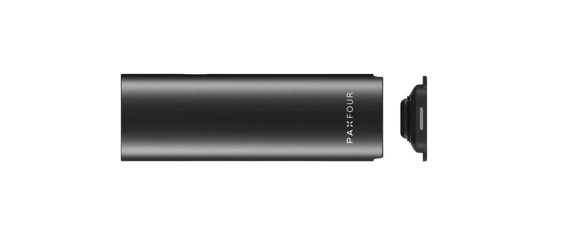 Vaporisateur PAX Four avec couvercle du four retiré Vaporisateur PAX Four noir présenté à l’horizontale avec le couvercle du four retiré, mettant en avant son corps compact et sa chambre inférieure amovible